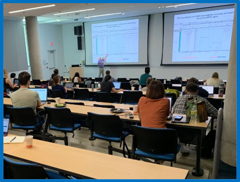 A group of people in a meeting for Bulk RNA sequencing workshop.